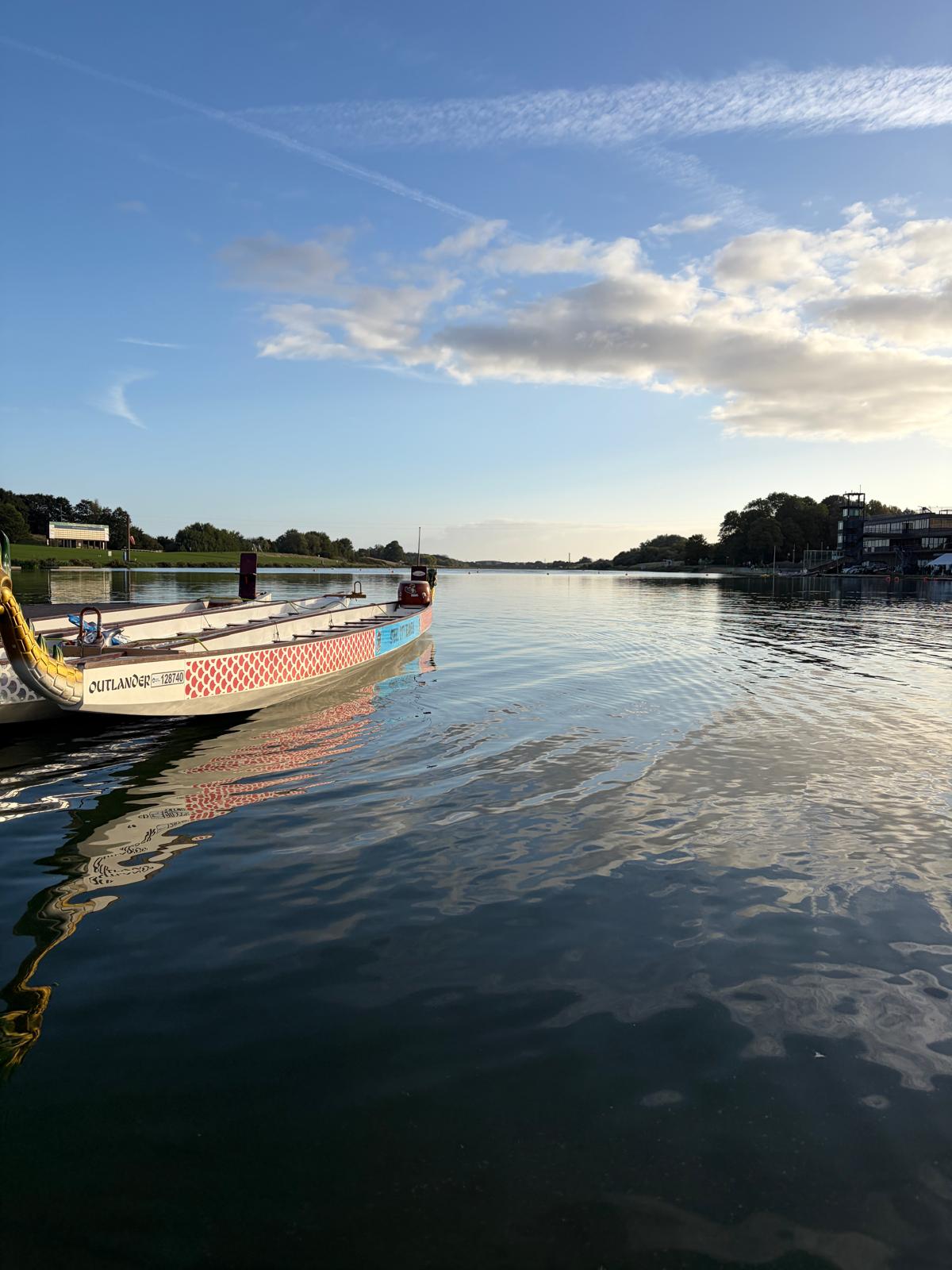 Dragon boat racing across the water