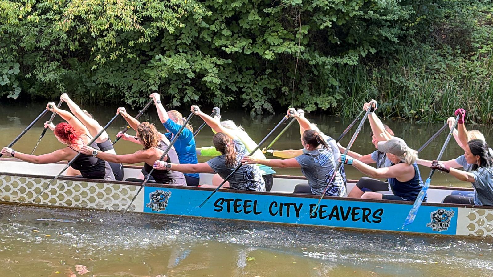 Steel City Beavers paddling in rhythm